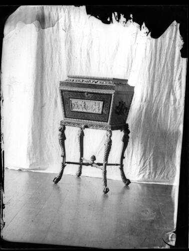Glass plate negative showing a chest on pedestal Glass plate negative showing a chest on pedestal