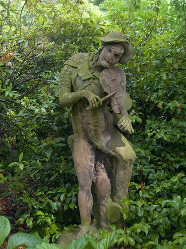 Figure playing a violin or fiddle