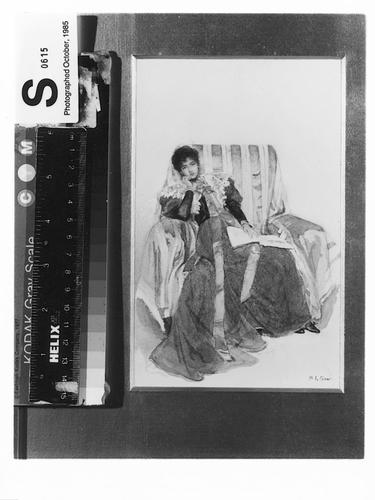 Girl seated with a book, full-length in an armchair Girl seated with a book, full-length in an armchair