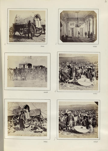 Man guarding a food supply waggon while encamped by a river in South Africa