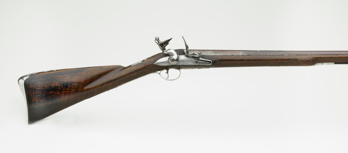 Flintlock gun, one of a pair