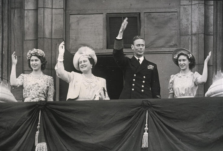 King George VI (1895-1952) and family celebrate VJ Day on the balcony of Buckingham Palace