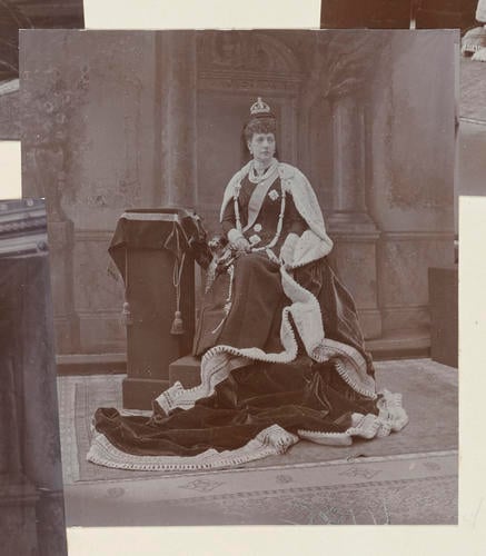 Master: Page 23 of Princess Victoria's album: photographs of King Edward VII and Queen Alexandra, dressed for the State Opening of Parliament, February 1901
Item: Queen Alexandra (1844-1925), dressed for the State Opening of Parliament, 1901