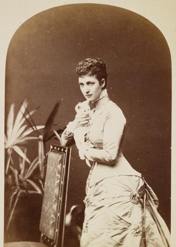 Portrait photograph of the Princess of Wales (1844-1925), later Queen Alexandra, holding a kitten, c. 1870