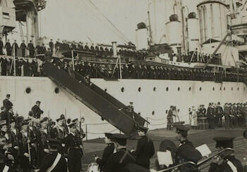 Master: Page 44 of Queen Mary's Album, volume 19 (15th July 1918 - 22nd June 1921)
Item: The Prince of Wales disembarking off HMS Renown, at Portsmouth