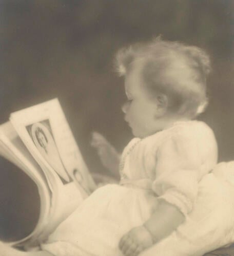 Princess Elizabeth (b. 1926) looking at pictures of her parents, 20 January 1927 Princess Elizabeth (b. 1926) looking at pictures of her parents, 20 January 1927