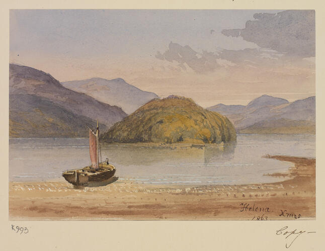 View of a boat pulled up onto the shore of a lake