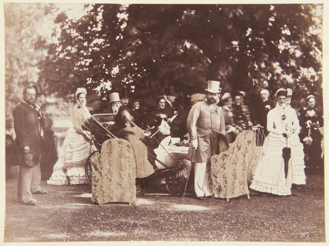 Queen Victoria, Prince Albert Edward and the Princess of Wales with unidentified group, c. 1880. [Album: Photographic Portraits, Vol. 5/63 1875-1889]