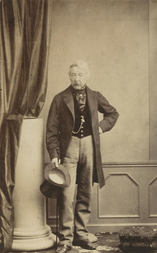 Portrait of an unknown man holding a top hat Portrait of an unknown man holding a top hat