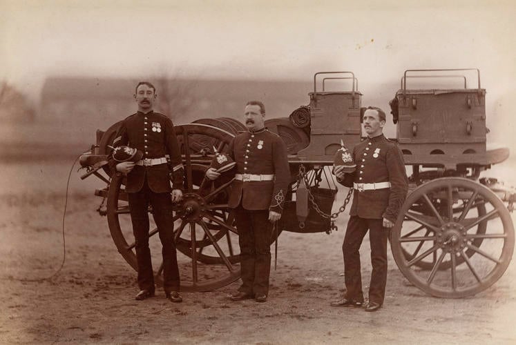 Three soldiers from the Royal Engineers beside a telegraph wagon during the Anglo-Egyptian War