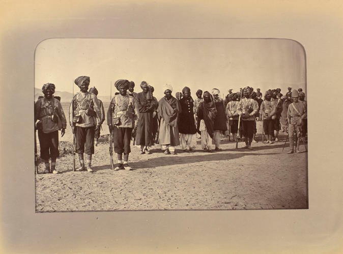 Afghan prisoners with a British Army escort