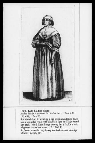 Lady holding gloves Lady holding gloves
