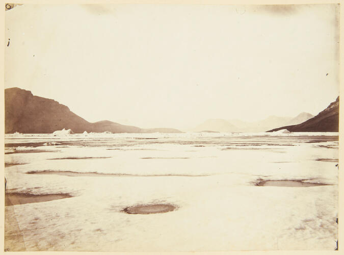 Dobbin Bay, 79° 35’ N, Empress Eugénie Glacier in distance Dobbin Bay, 79° 35’ N, Empress Eugénie Glacier in distance
