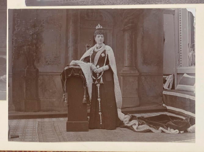 Master: Page 23 of Princess Victoria's album: photographs of King Edward VII and Queen Alexandra, dressed for the State Opening of Parliament, February 1901
Item: Queen Alexandra dressed for the State Opening of Parliament