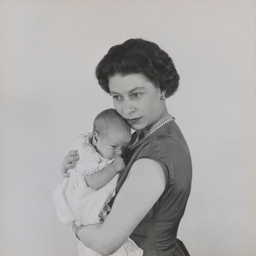 Queen Elizabeth II holding Prince Andrew