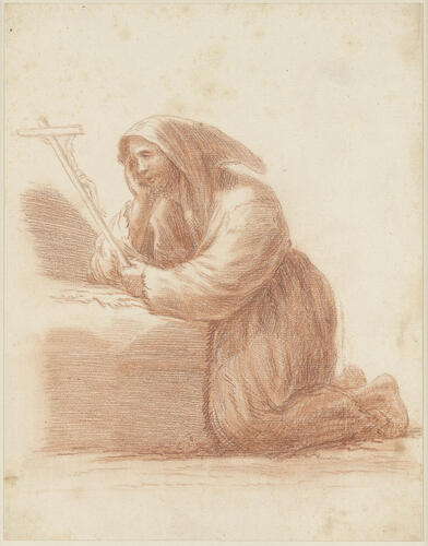 Saint Francis kneeling, holding a crucifix