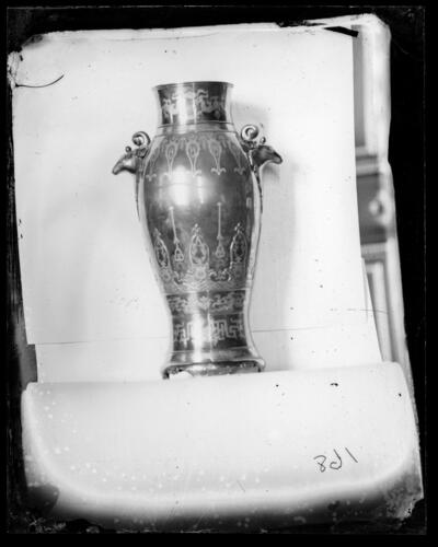 Glass plate negative of a bronze vase