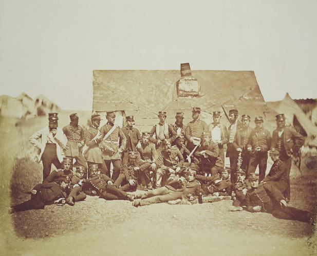 Group outside hut. [taken from contents list]. [Crimean War photographs by Robertson]