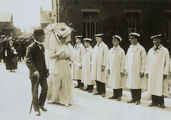 Master: Page 26 of Queen Mary's Album, volume 18, 20 June 1916 to 20 September 1918
Item: King George V and Queen Mary on a walkabout in Hull, 18 June 1917