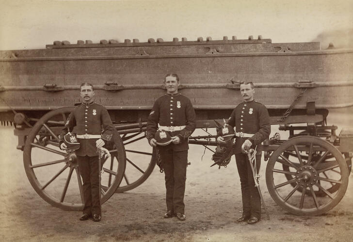 Three soldiers from the Royal Engineers beside a pontoon wagon during the Anglo-Egyptian War