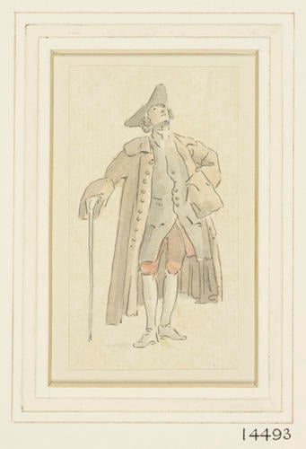 A man standing, looking upwards
