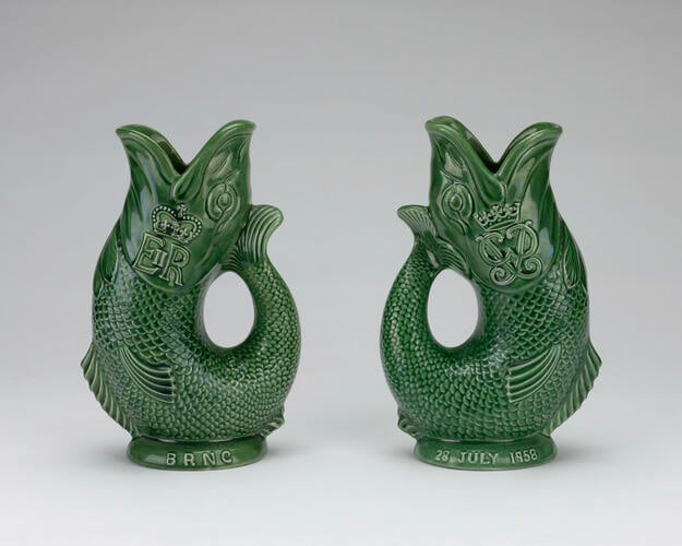 Master: A pair of fish gurgle jugs