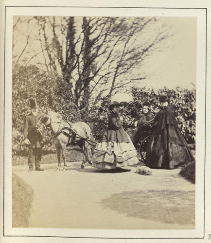 Group with horse-drawn carriage