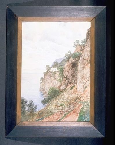 White house on a cliff, overlooking the sea