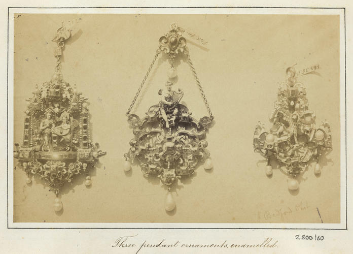 'Three pendant ornaments, enamelled'