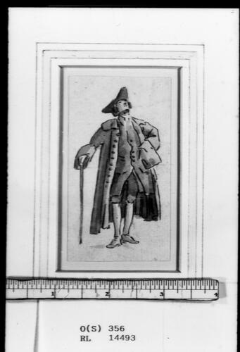A man standing, looking upwards