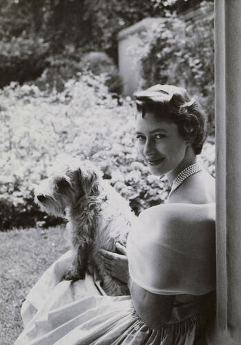 Princess Margaret with dog, 1955. [From Princess Margaret's Collection]