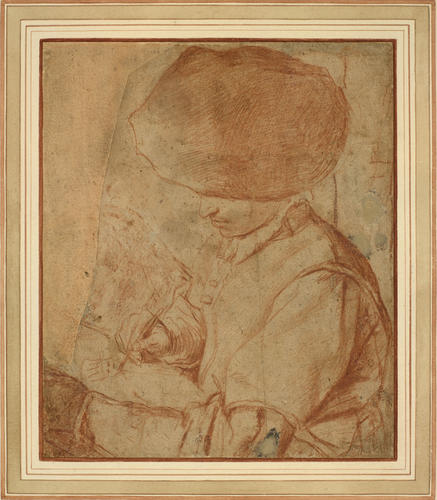 A young man drawing