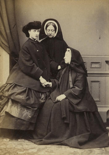 Queen Victoria (1819-1901), Princess Alexandra of Denmark, later Queen Alexandra (1844-1925) and an unidentified woman