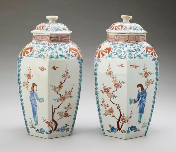 Master: Matched pair of hexagonal jars and covers