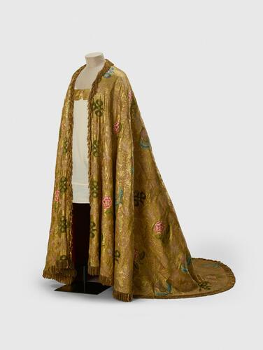 The Imperial Mantle, worn by King George IV, King George V, King George VI, Queen Elizabeth II and King Charles III The Imperial Mantle, worn by King George IV, King George V, King George VI, Queen Elizabeth II and King Charles III