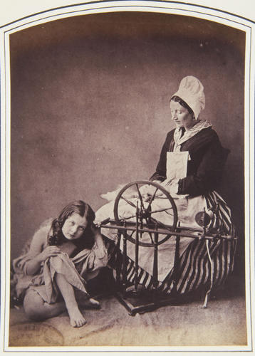 Study of a woman with a spinning wheel and a young girl