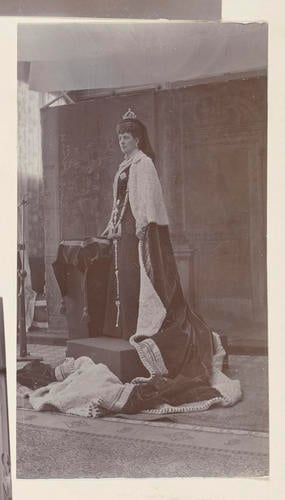 Master: Page 23 of Princess Victoria's album: photographs of King Edward VII and Queen Alexandra, dressed for the State Opening of Parliament, February 1901
Item: Photograph of Queen Alexandra, dressed for the State Opening of Parliament, February 1901