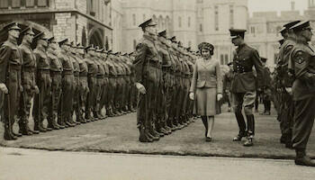 Master: Page 32 of Queen Mary's Album, vol. 30 (6th October 1940 - 11th November 1943)
Item: Princess Elizabeth on an inspection of Grenadier Guards