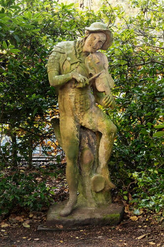 Figure playing a violin or fiddle