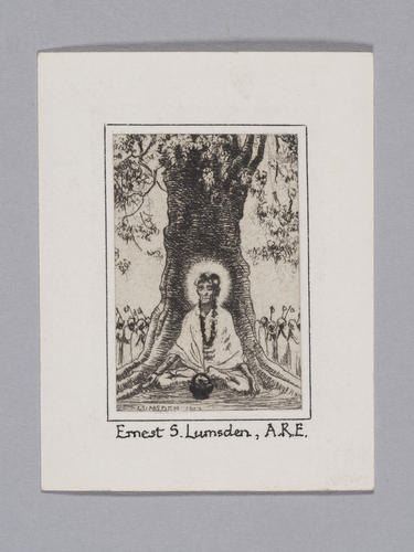 A holy man sitting under a tree