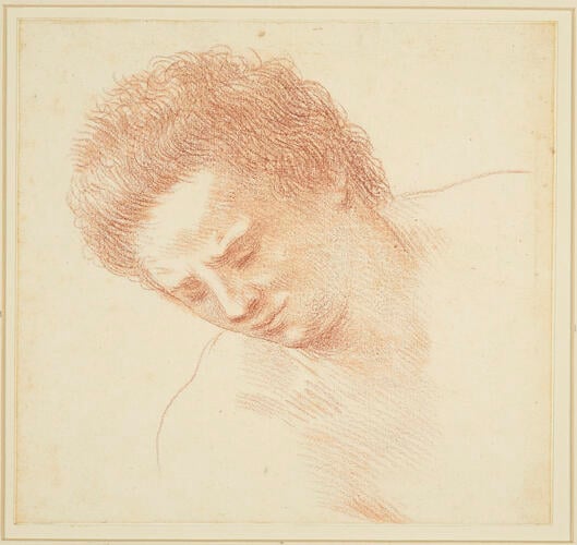 The head and shoulders of a man bending downwards to the left The head and shoulders of a man bending downwards to the left