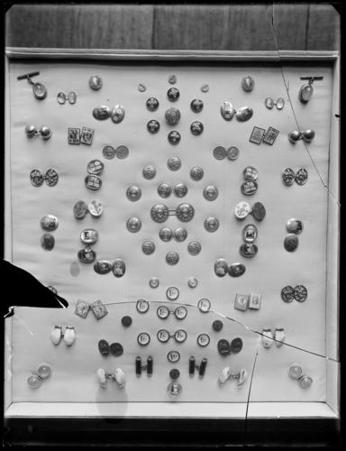 Glass plate negative of links and studs belonging to George V