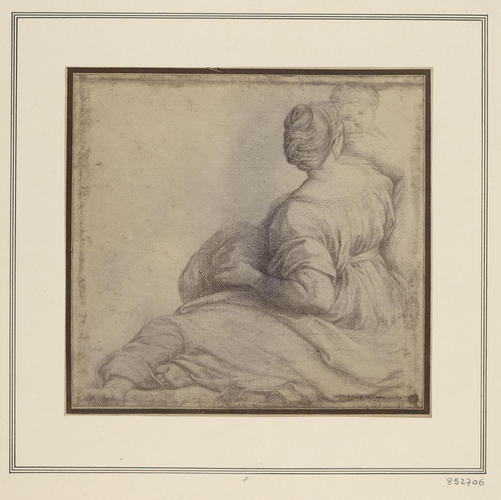 A seated woman and child