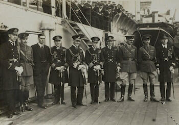 Master: Page 44 of Queen Mary's Album, volume 19 (15th July 1918 - 22nd June 1921)
Item: The Prince of Wales, his household and officers of HMS Renown, at Portsmouth