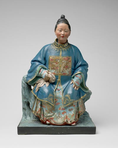 Master: Clay figures of seated Chinese man and woman