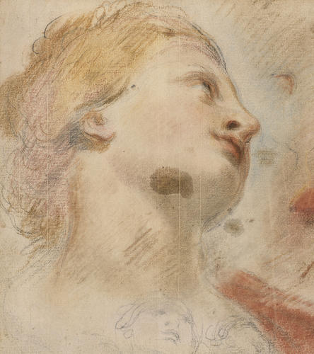The head of a woman looking upwards The head of a woman looking upwards