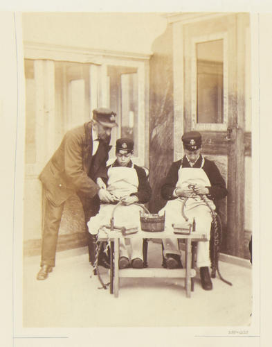 Mr Furneaux supervising Prince George and Prince Eddy in rope making Mr Furneaux supervising Prince George and Prince Eddy in rope making