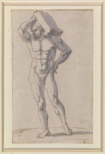 A nude man holding a stone slab