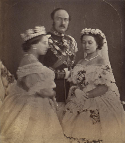 Queen Victoria, the Prince Consort and Victoria, Princess Royal in the dress they wore at the marriage of Princess Royal