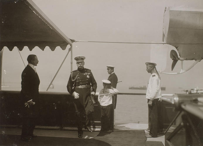 A group of men on the deck of the Russian Imperial Yacht Standart during the Cowes Regatta, 1909 A group of men on the deck of the Russian Imperial Yacht Standart during the Cowes Regatta, 1909